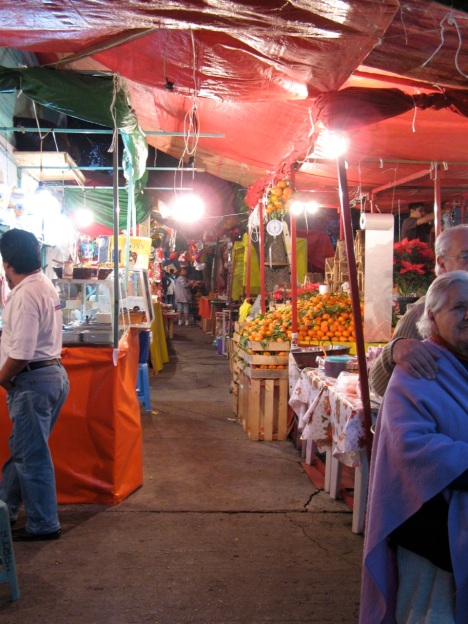 ...dozens of holiday stalls filled the porticos around the market in Escandón....